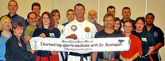 ALT =[“Black Belts Learned Better Training with Dr. Jolie Bookspan: Students of Dr. Bookspan's Black Belt Hall of Fame 2011 seminar on the Top 10 Injury Prevention Techniques.”] 