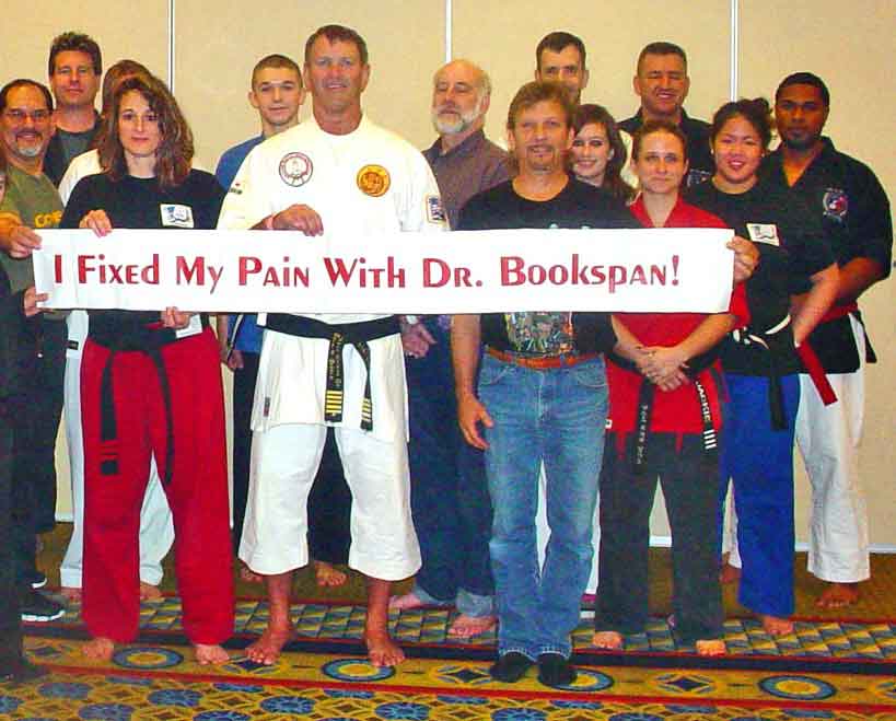 ALT =[“Students of Dr. Bookspan at the Black Belt Hall of Fame: Learn effective martial arts with healthier technique at Dr. Bookspan's classes”] 